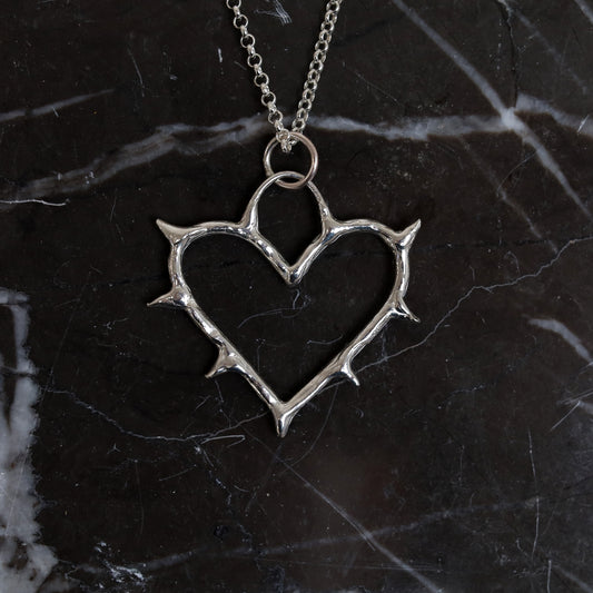 Sterling Silver Cold Hearted Pendant