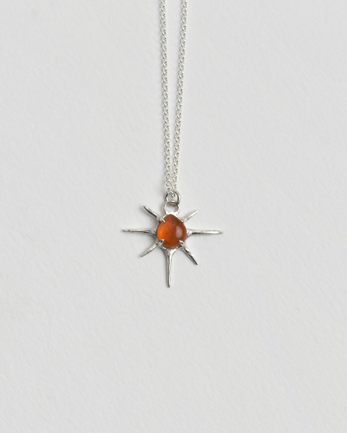 The Sunset Pendant from Evie Spicer Jewellery comes in recycled sterling silver, front view.