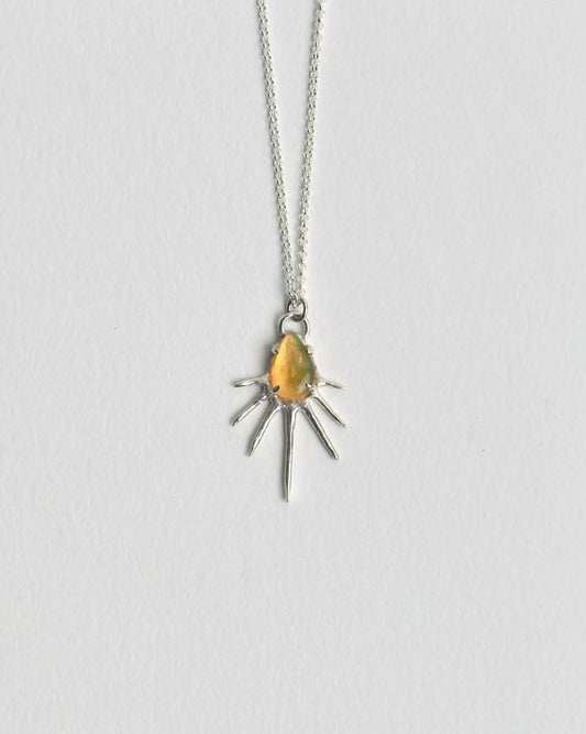 The Sunrise Pendant from Evie Spicer Jewellery comes in recycled sterling silver, front view.