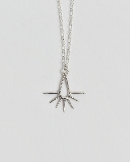 The Water Pendant from Evie Spicer Jewellery comes in recycled sterling silver, front view.