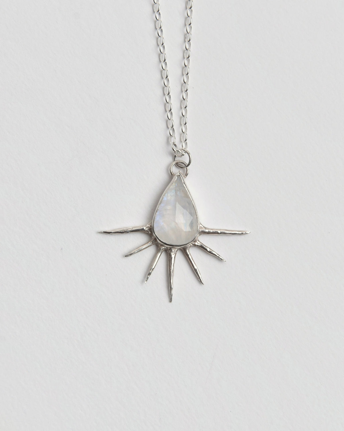 The Moonstone Dawn Pendant from Evie Spicer Jewellery comes in recycled sterling silver, front view.