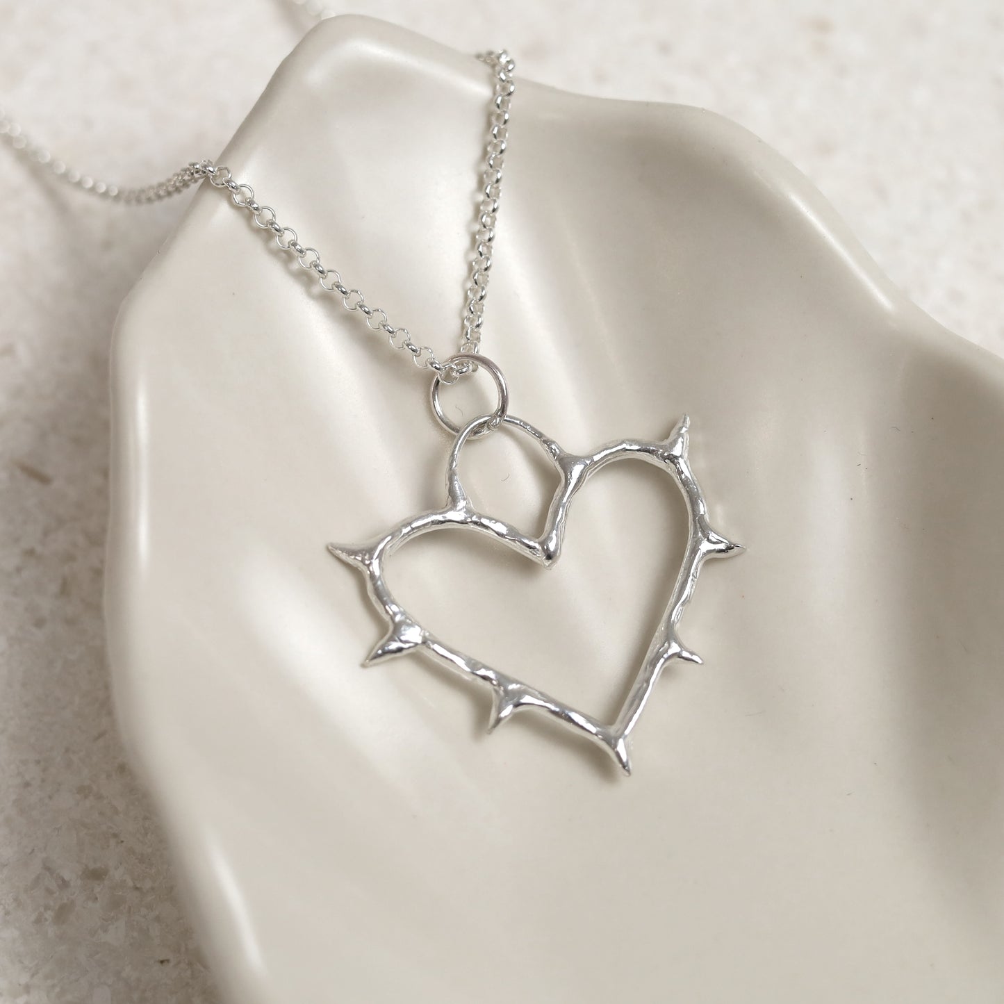 Sterling Silver Cold Hearted Pendant