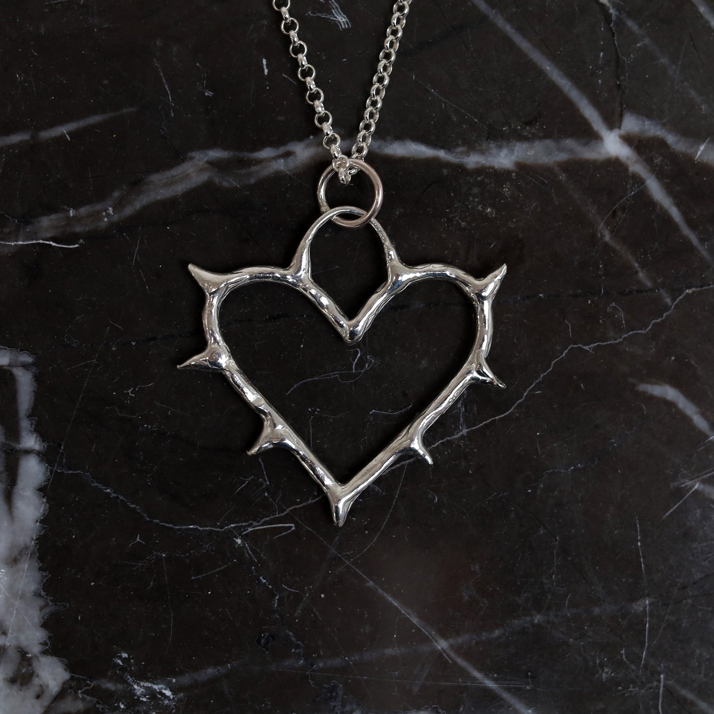 Sterling Silver Cold Hearted Pendant